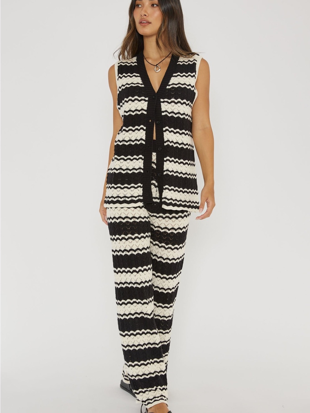 Sleeveless Black & Cream Striped Knit Jumpsuit